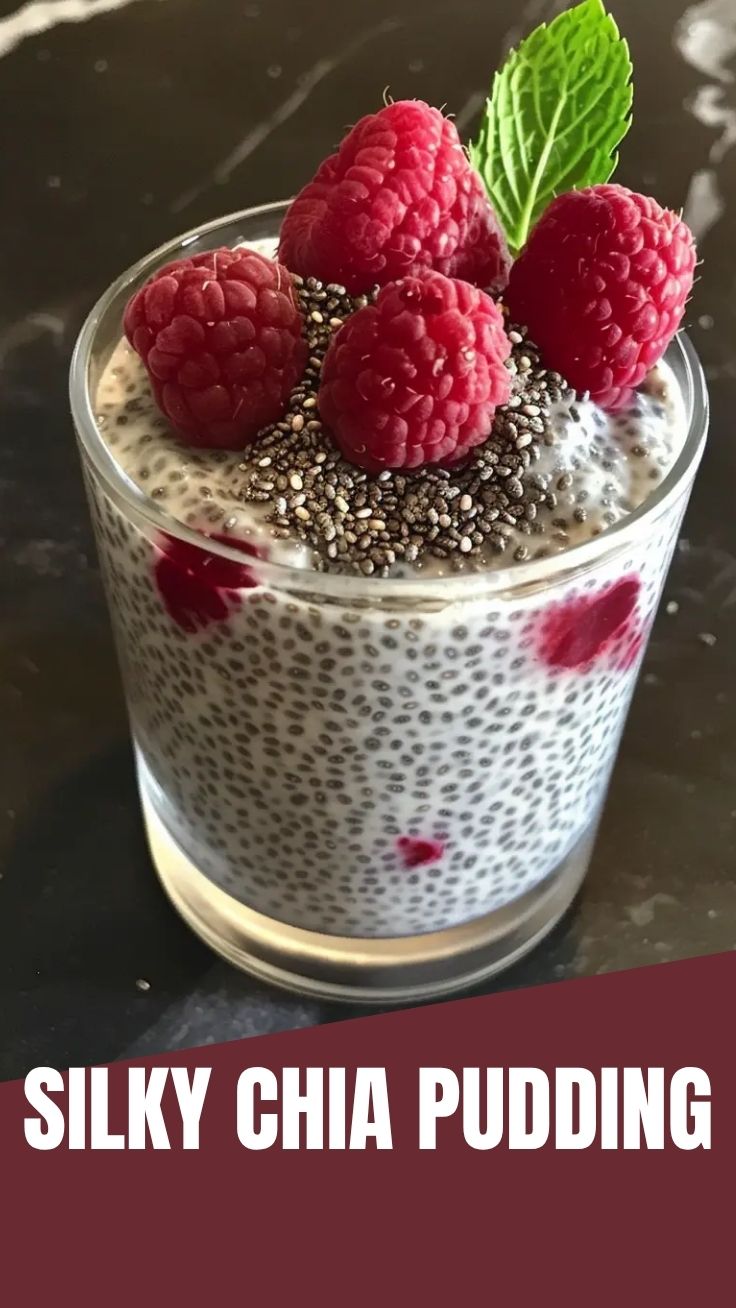 A bowl of healthy chia pudding, topped with fresh berries and nuts.