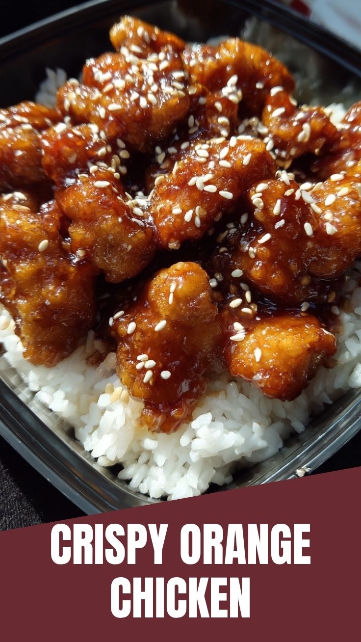 A portion of Orange Chicken (Panda Express Style) with a glossy sauce and garnished with green onions