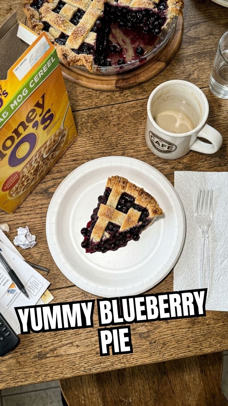 A freshly baked blueberry pie with a lattice top crust