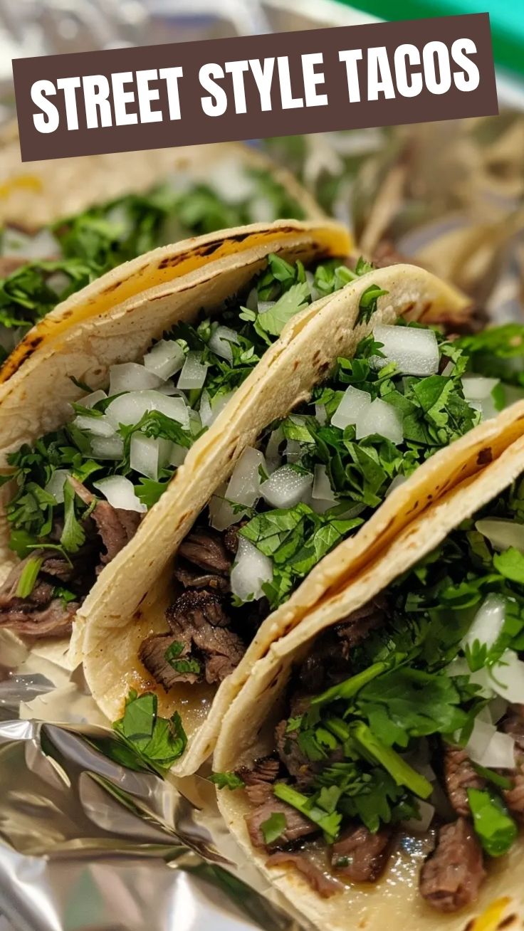 Close-up of three delicious beef tacos with fresh toppings