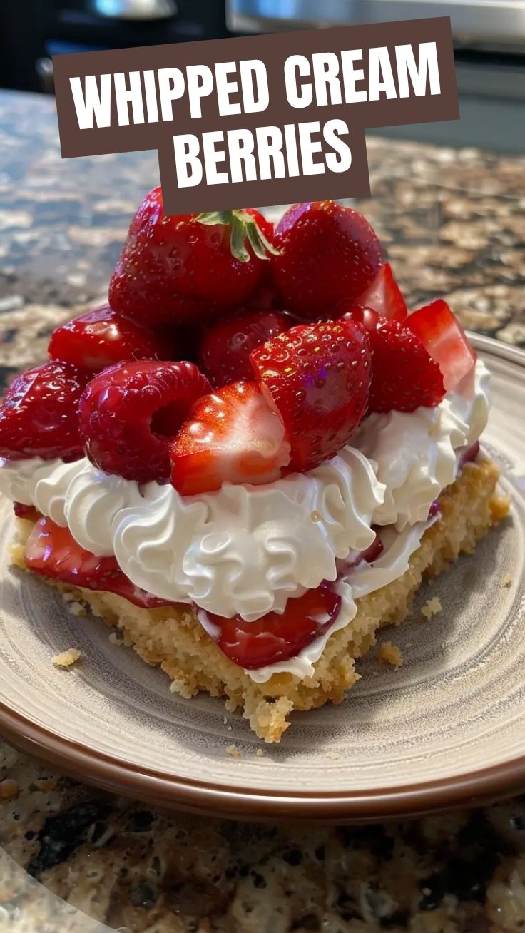 A delectable strawberry shortcake featuring fresh strawberries, whipped cream, and fluffy biscuits.