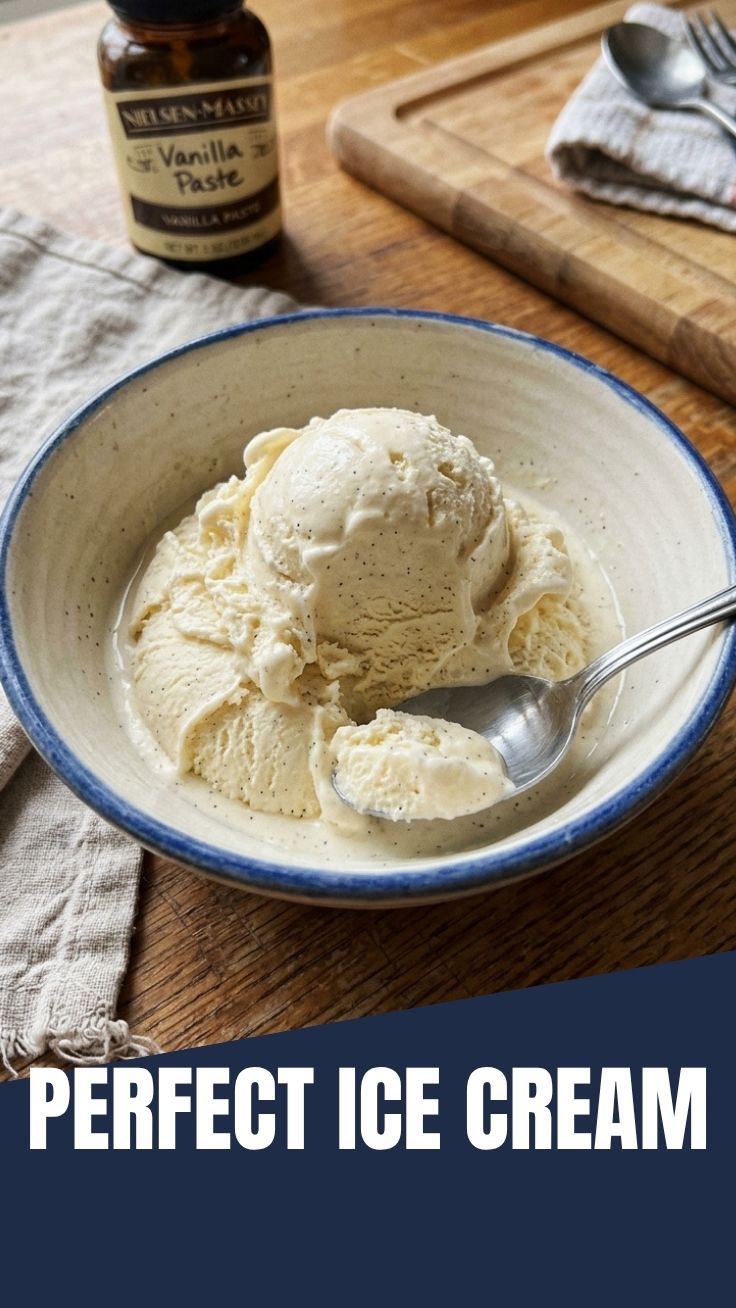 A scoop of homemade vanilla ice cream in a bowl