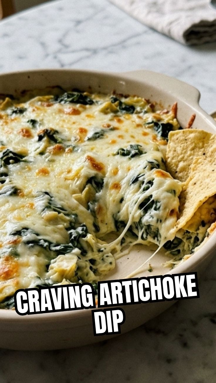A bubbling hot dish of spinach artichoke dip, freshly baked